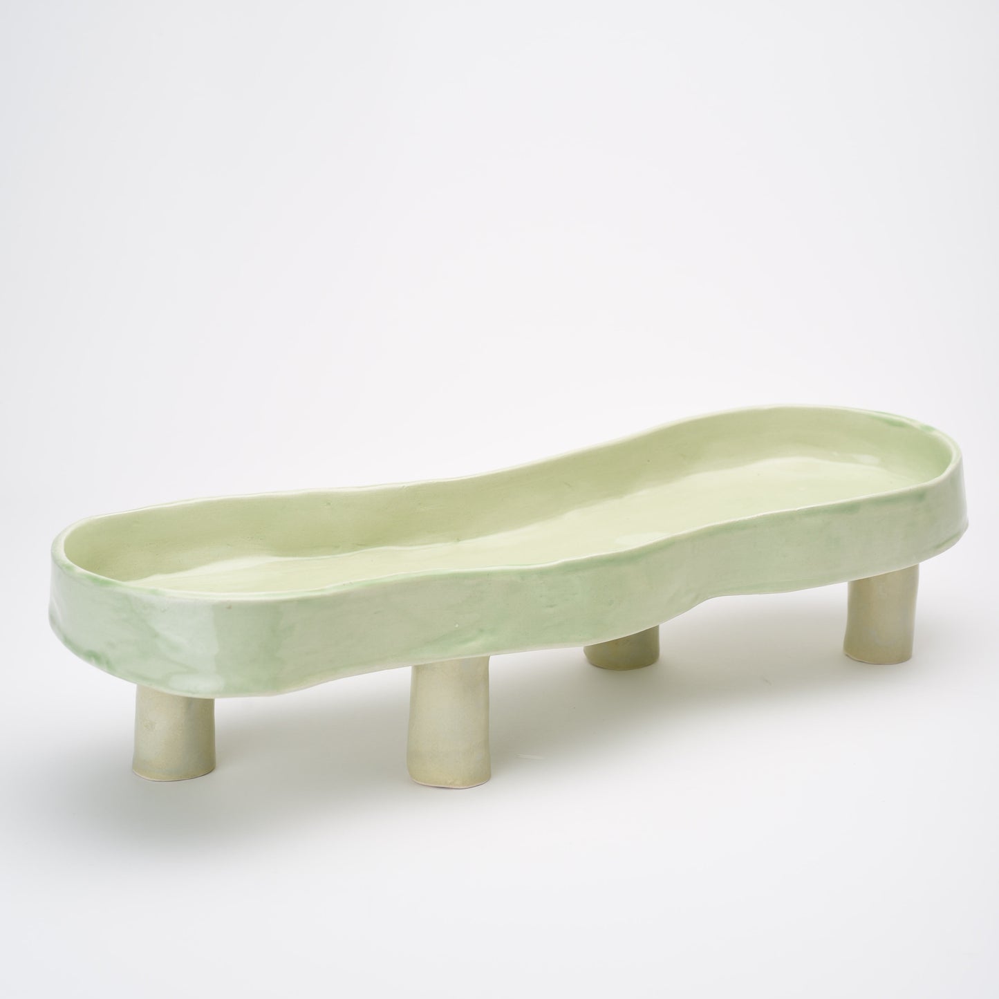 Ceramic elevated oval thin flat bowl