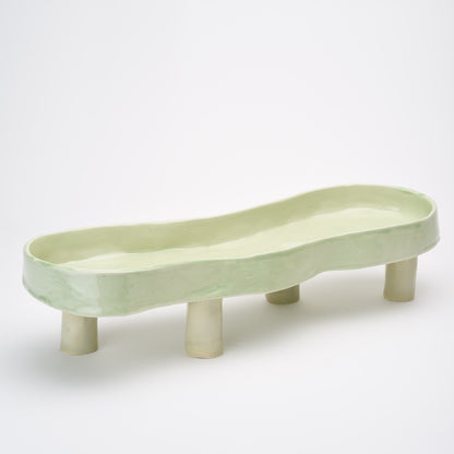 Ceramic elevated oval thin flat bowl