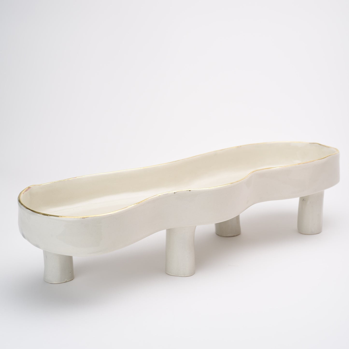 Ceramic elevated oval thin flat bowl