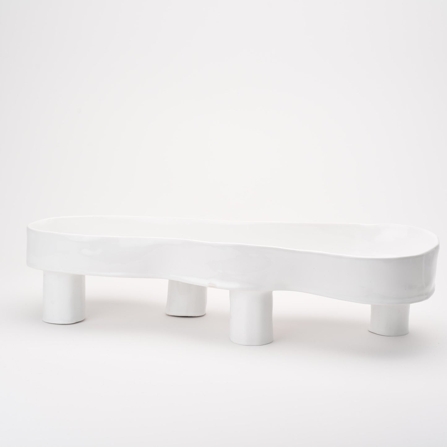 Ceramic elevated oval thin flat bowl